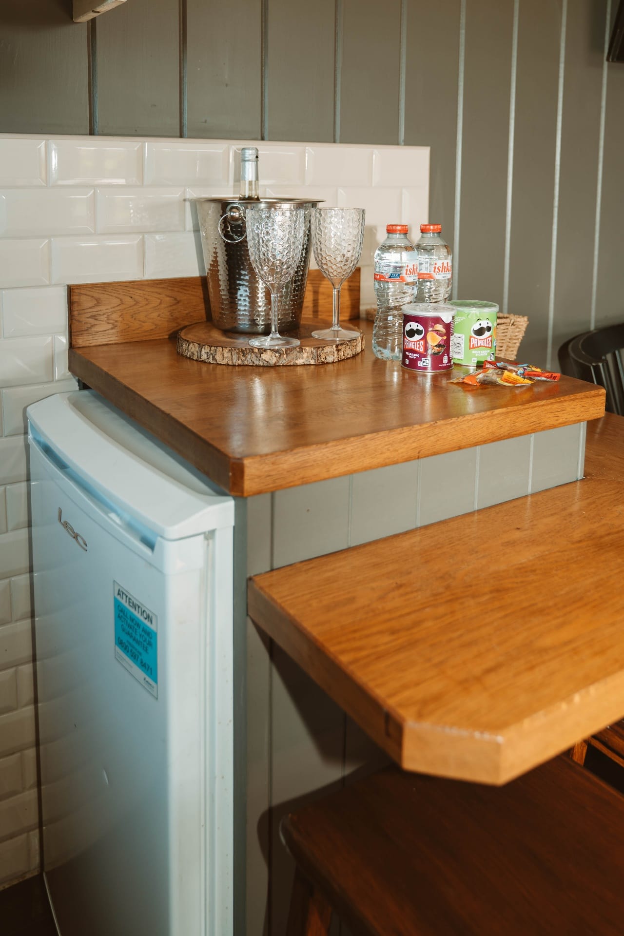Shepherd's Hut welcome treats and kitchenette counter