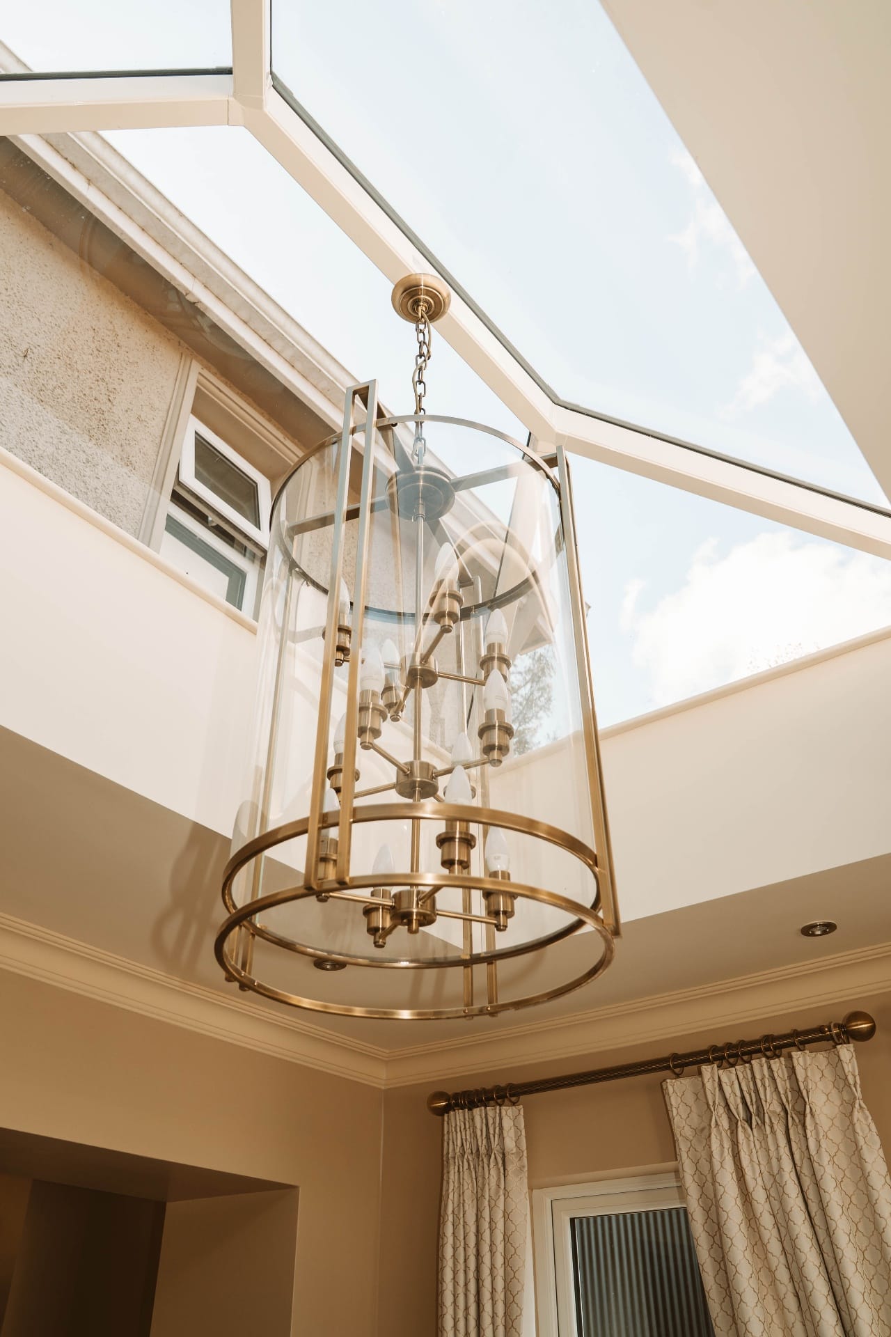 Farmhouse lantern light beneath the skylight