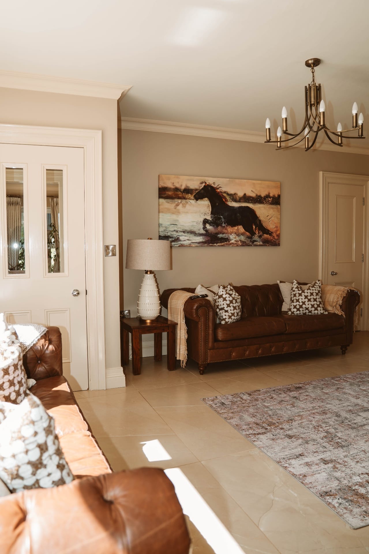 Farmhouse lounge with horse artwork