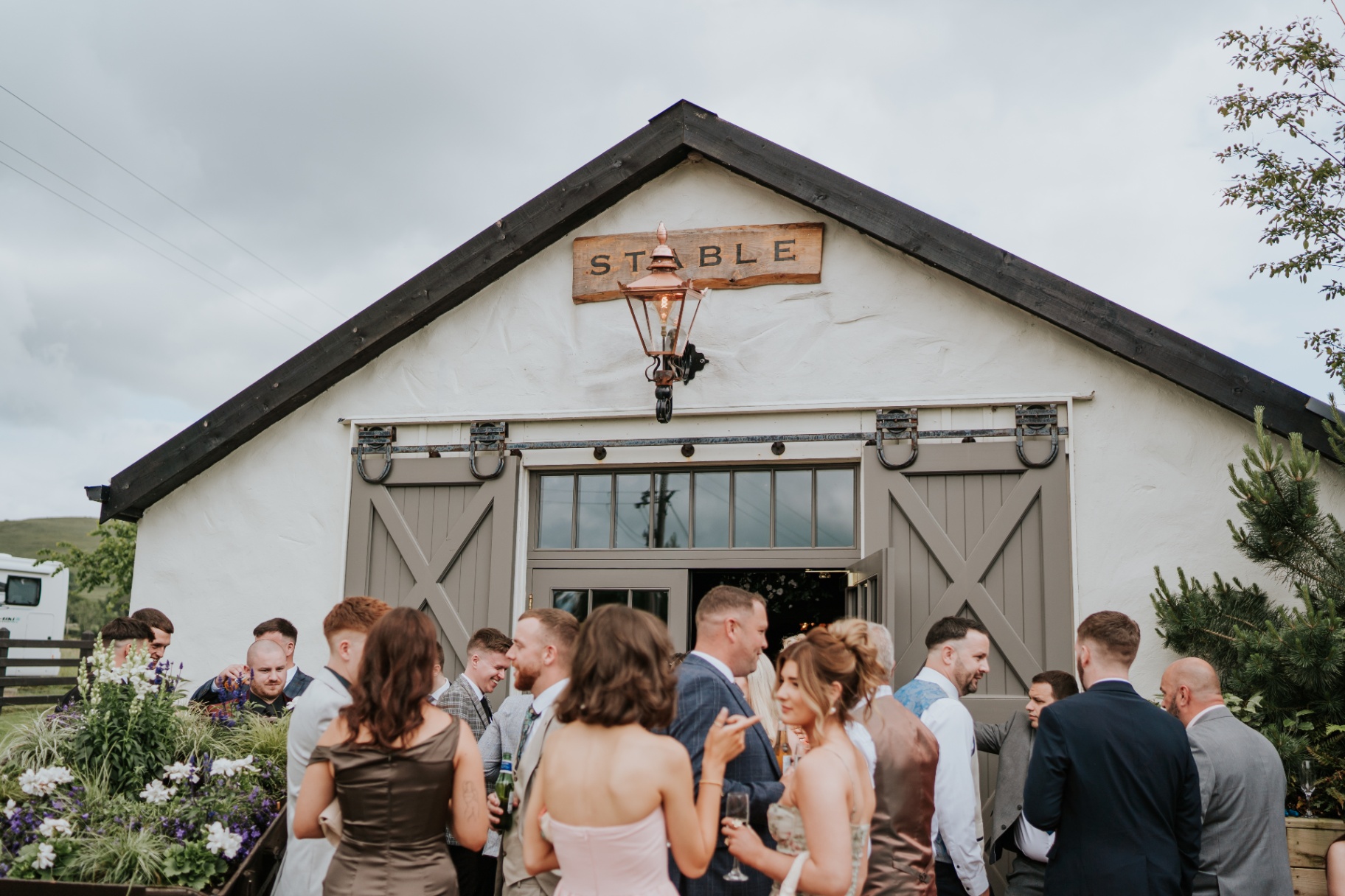 Guests gathered outside The Stable bar