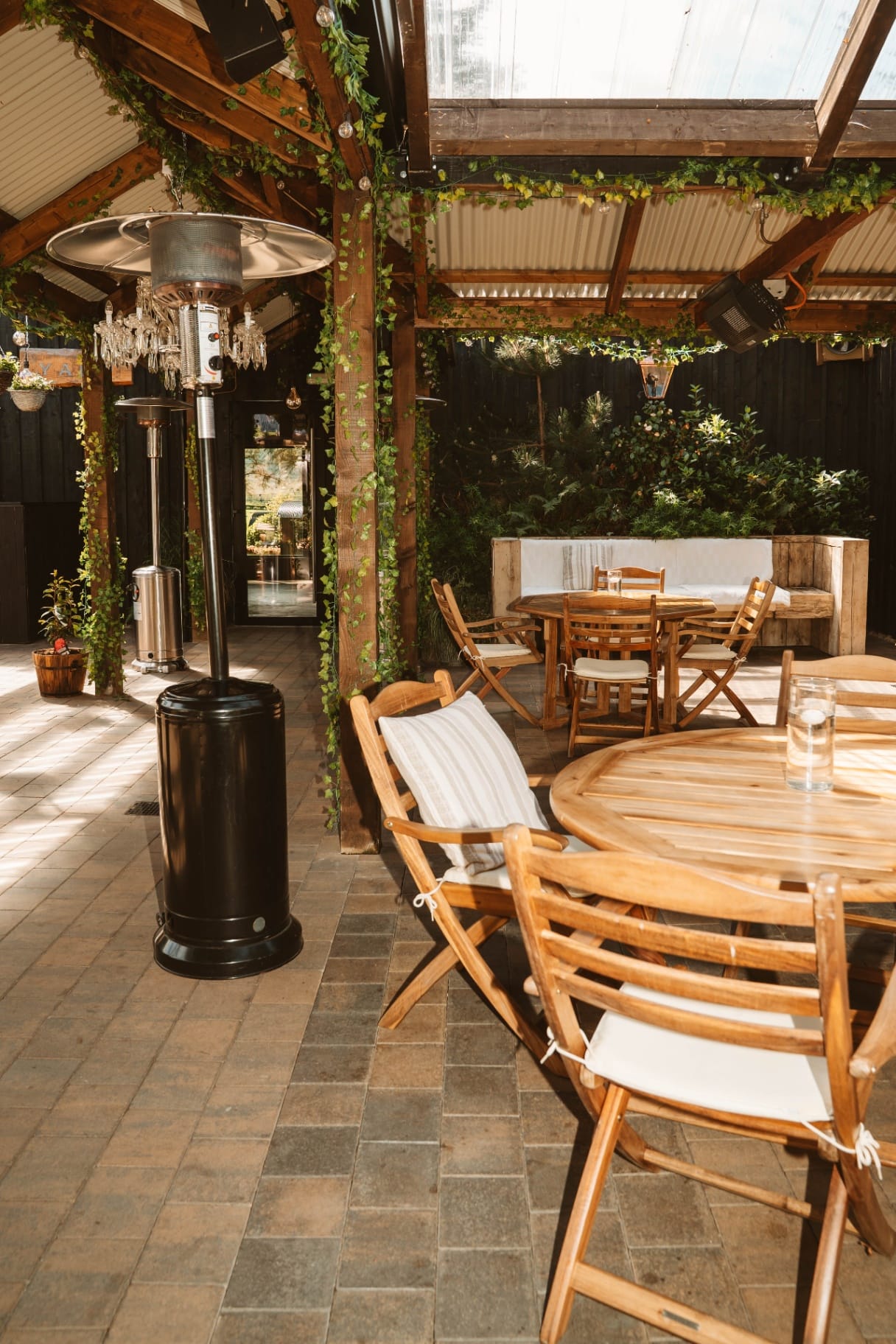 Pergola lounge seating with patio heaters