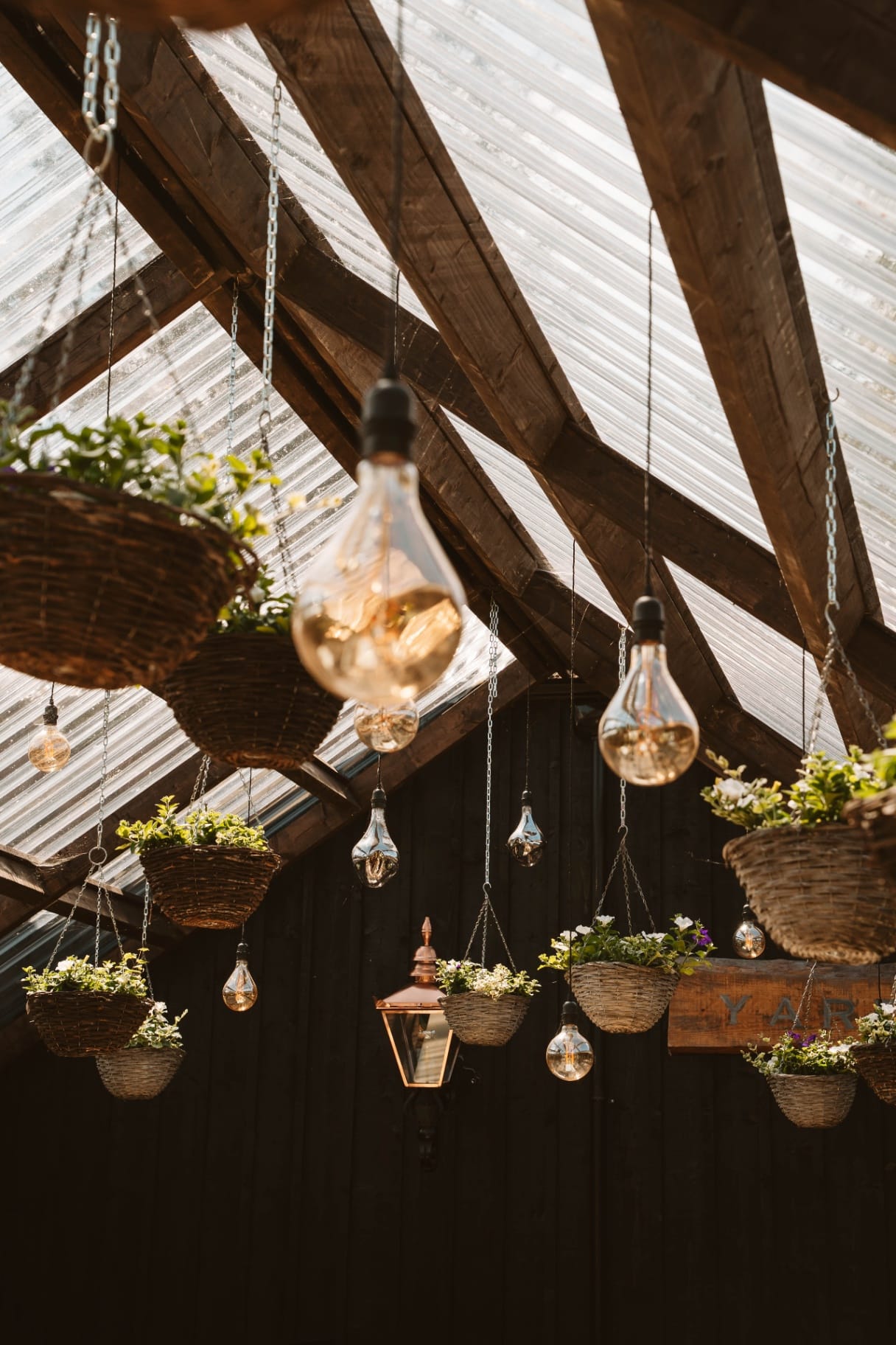 Detail of the Pergola lanterns and hanging baskets