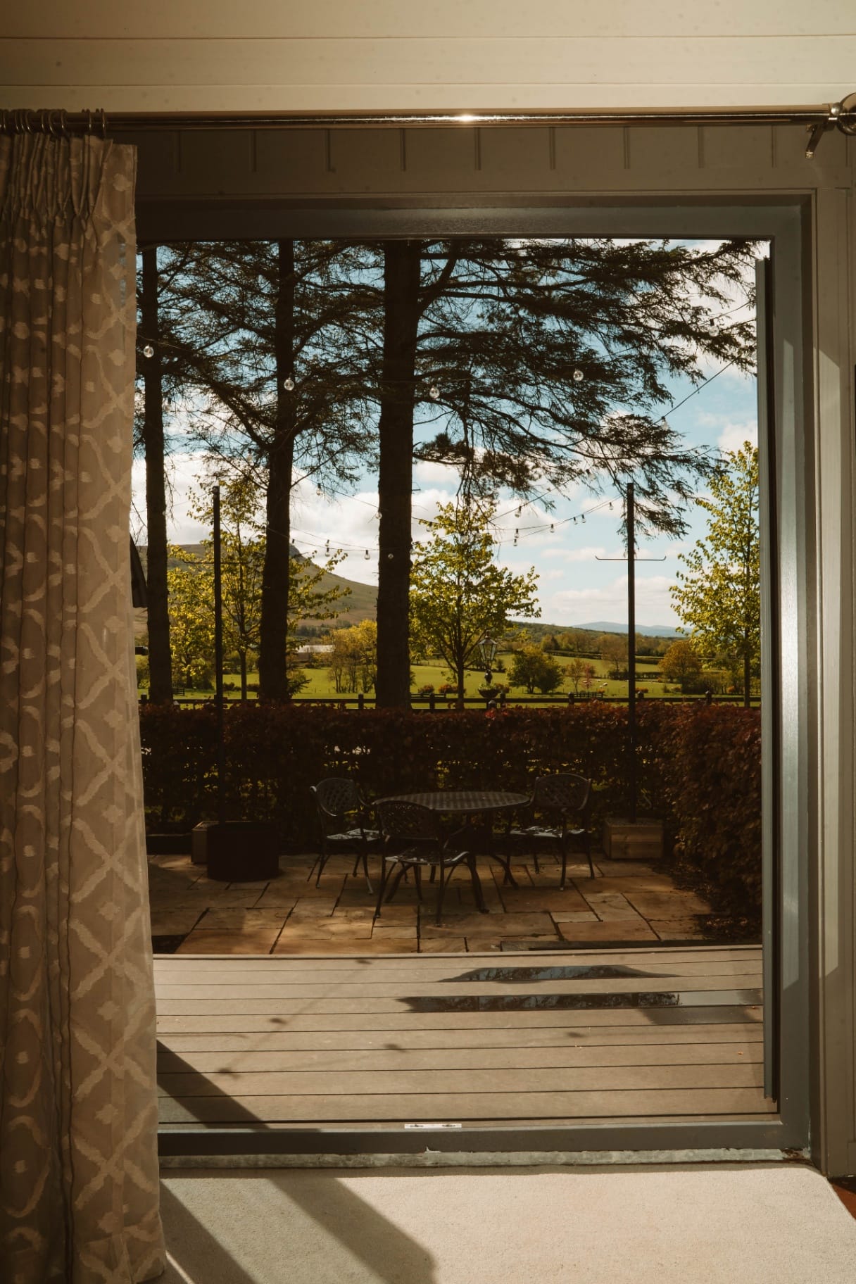 Shepherd's Hut patio and mountain view from inside