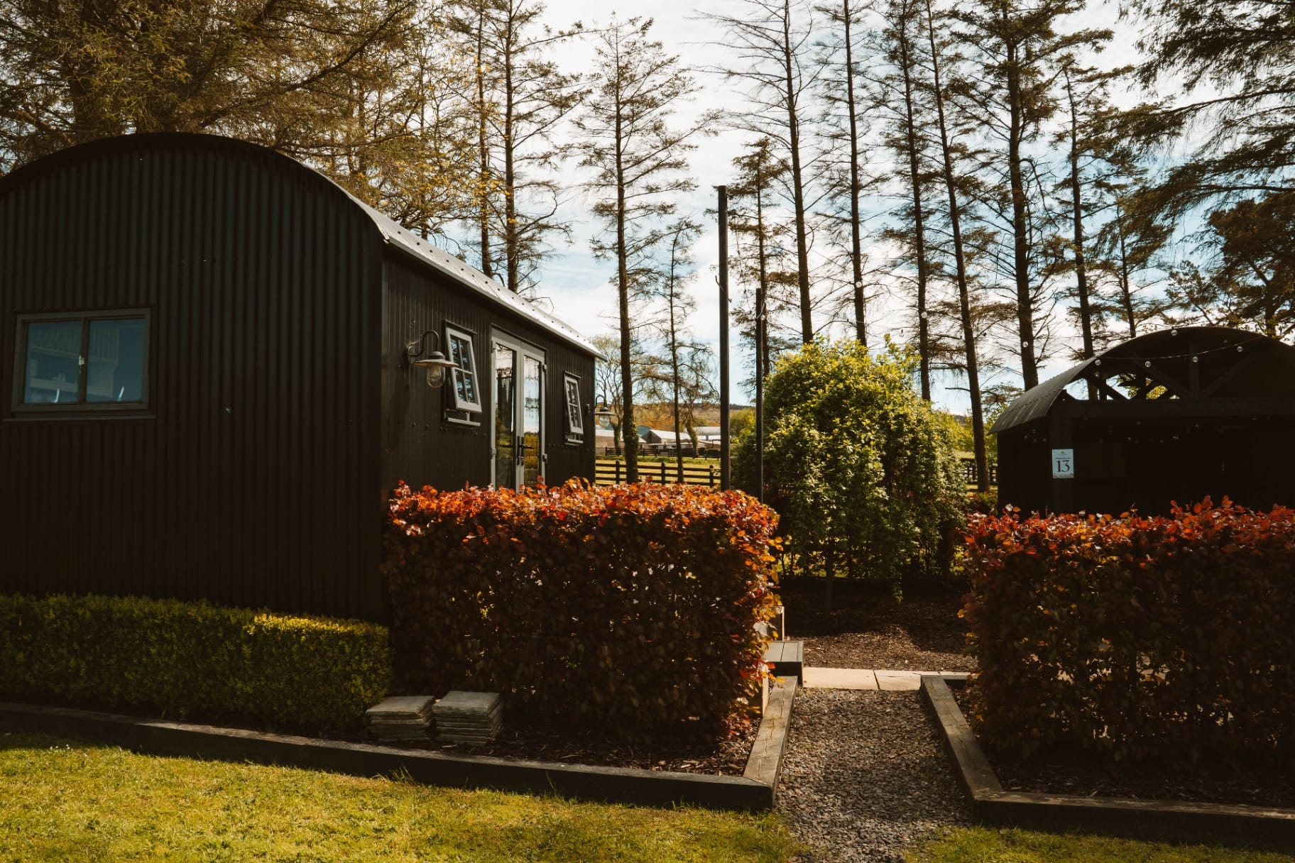 Shepherd's Huts garden path and exterior view