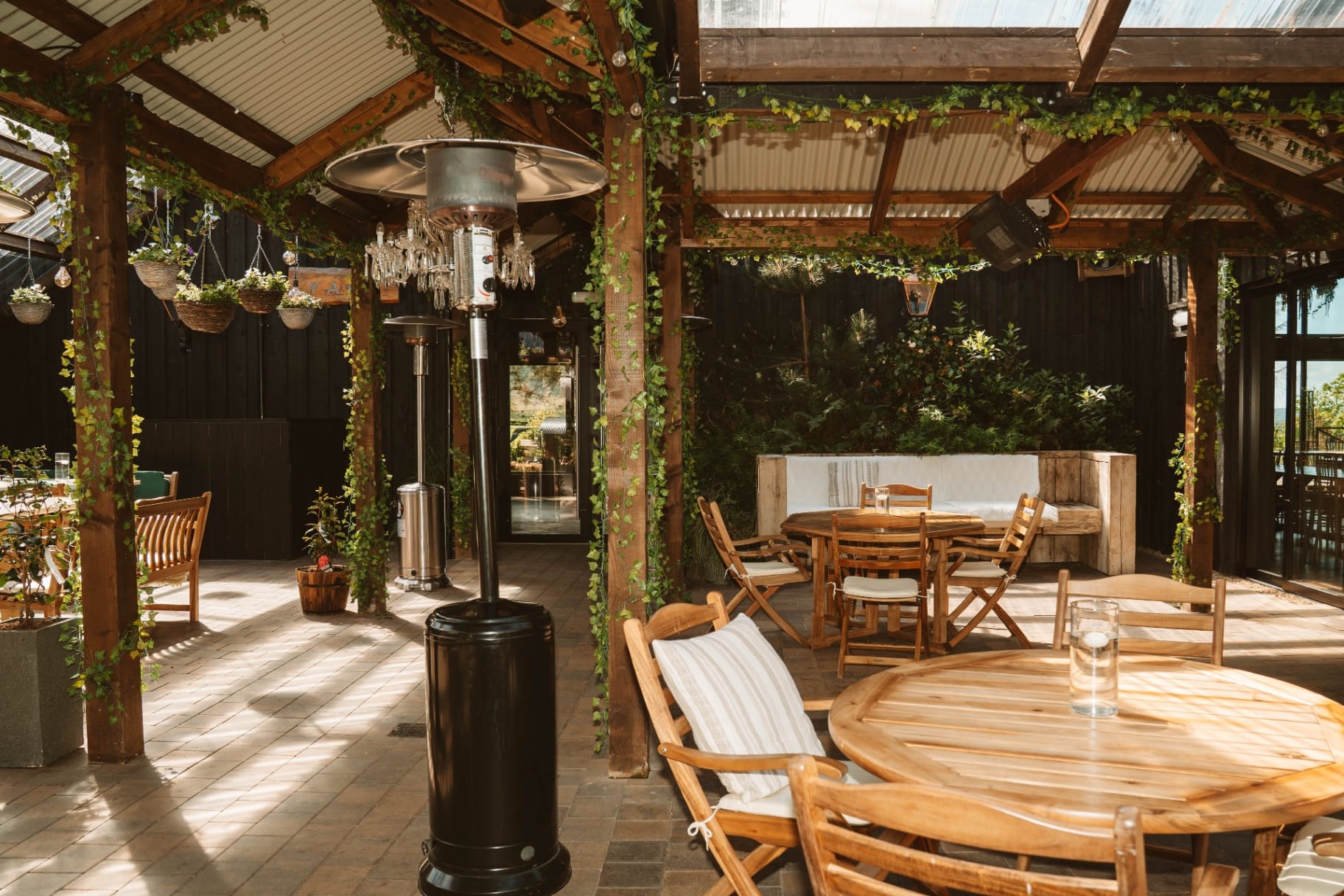 Vine-wrapped pergola dining