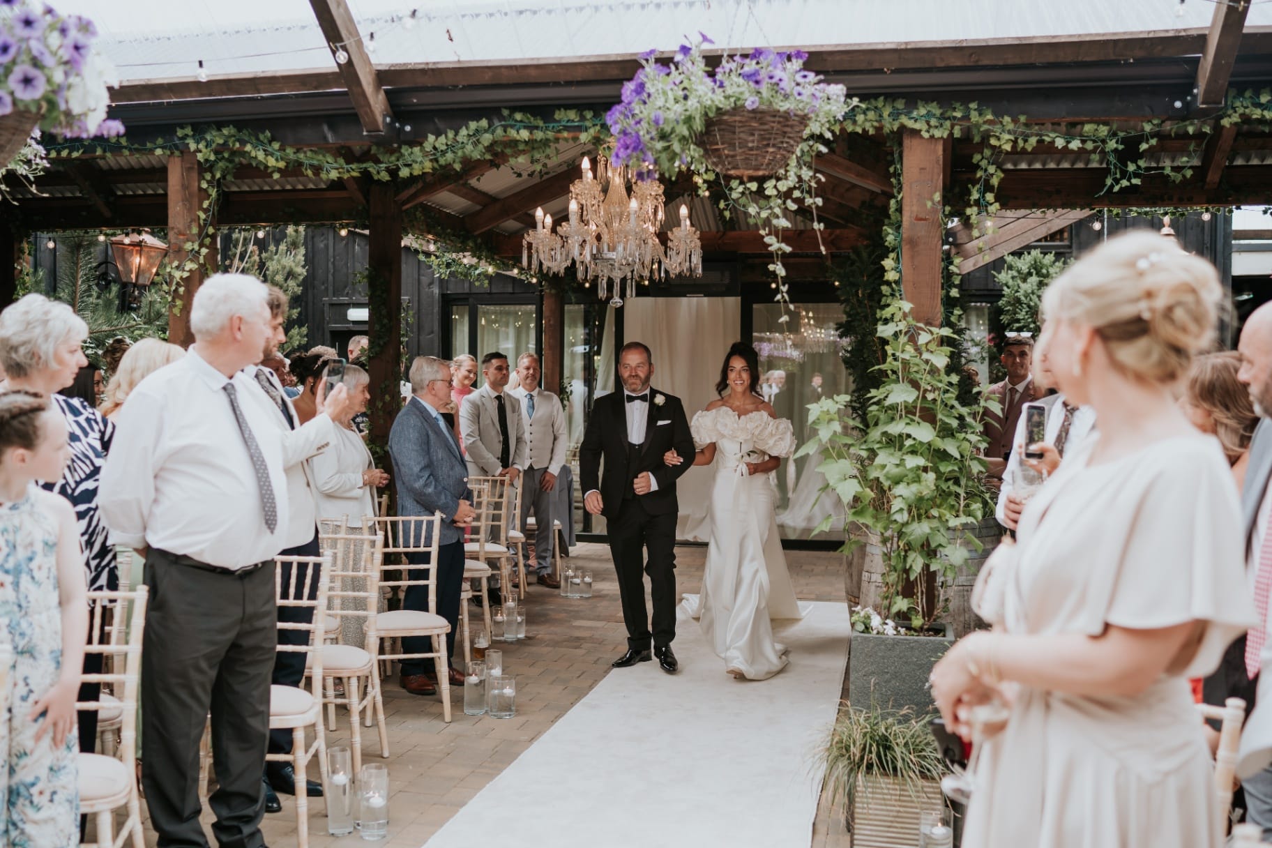 Courtyard aisle with chandelier