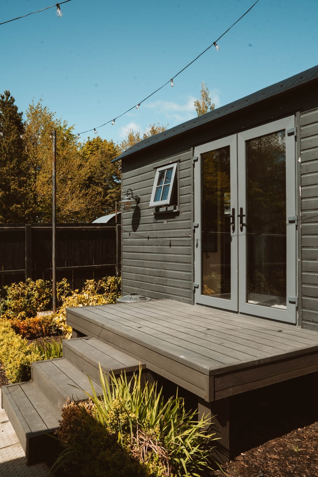 Shepherd's Hut deck steps and exterior doors